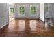 Inviting living room with refinished hard wood floors, fresh paint and lots of natural light at 156 Page Pl, Canton, GA 30114