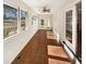 Bright sunroom featuring tile flooring and multiple windows, providing ample natural light at 156 Page Pl, Canton, GA 30114