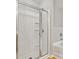 Main bath with glass shower enclosure, and separate tub at 2297 Elmbridge Rd, Buford, GA 30519