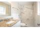Bright bathroom showcasing granite countertop, decorative tile walk-in shower at 4063 Elmscourt Dr, Stone Mountain, GA 30083