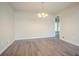 Open dining area featuring a chandelier, wood floors, and an open layout at 4063 Elmscourt Dr, Stone Mountain, GA 30083