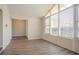 Sunroom-style living area with hardwood-style floors and bright windows at 4063 Elmscourt Dr, Stone Mountain, GA 30083