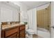 This bathroom features granite countertops, tiled floors and a shower/tub combo at 1307 Madison Se Ln, Smyrna, GA 30080