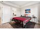 Bright bedroom features modern decor and an ensuite bathroom entrance at 200 River Vista Dr # 502, Atlanta, GA 30339