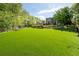 Well-maintained dog park with artificial turf, landscaping, and park benches at 200 River Vista Dr # 502, Atlanta, GA 30339