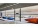 Secured kayak storage area with chain-link fencing and labeled signage at 200 River Vista Dr # 502, Atlanta, GA 30339