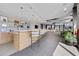 Common room featuring a bar, ample seating, modern decor, and a cozy fireplace in the background at 250 Pharr Ne Rd # 1702, Atlanta, GA 30305