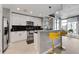 Modern kitchen featuring stainless steel appliances, breakfast bar, and an open layout at 250 Pharr Ne Rd # 1702, Atlanta, GA 30305