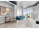 Stylish living room featuring concrete accents, large windows, and modern furnishings at 250 Pharr Ne Rd # 1702, Atlanta, GA 30305