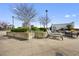 Rooftop deck with lounge chairs, tables, greenery, and city views, perfect for relaxation at 250 Pharr Ne Rd # 1702, Atlanta, GA 30305