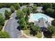 Aerial of community amenities featuring tennis courts, basketball court, pool, clubhouse, playground, and parking at 3258 Welmingham Sw Dr, Atlanta, GA 30331