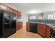 Traditional kitchen with stainless steel appliances, wood cabinets and eat in breakfast nook at 3258 Welmingham Sw Dr, Atlanta, GA 30331