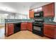Open kitchen featuring granite countertops, stainless appliances, and tile backsplash at 3258 Welmingham Sw Dr, Atlanta, GA 30331