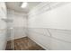 Walk-in closet with carpet and ample shelving space for storage at 3258 Welmingham Sw Dr, Atlanta, GA 30331
