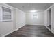 Unfinished basement with wood-look flooring and white trim for a modern, clean feel at 4094 E Glade Ct, Decatur, GA 30035
