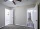 Bedroom featuring neutral walls, plush carpeting and an open doorway at 4094 E Glade Ct, Decatur, GA 30035