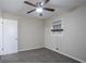 Well-lit bedroom featuring carpeted flooring, a ceiling fan, and neutral paint at 4094 E Glade Ct, Decatur, GA 30035