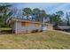 A single-story home with a well-maintained lawn and mature trees at 4094 E Glade Ct, Decatur, GA 30035