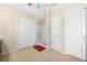 Bright bathroom with a walk-in shower, tile floors, a white closet and doors, and chrome hardware at 165 Babbling Brook, Mcdonough, GA 30252