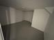 Spacious unfinished basement area with painted floor at 211 Wellington Sw St, Atlanta, GA 30314