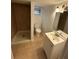 Bathroom featuring a shower and a vanity with a mirror at 211 Wellington Sw St, Atlanta, GA 30314