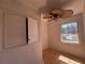 Bedroom needing renovation, offering natural light, and a ceiling fan at 4625 Orkney Sw Ln, Atlanta, GA 30331