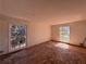 Bedroom needing renovation with natural light; awaiting transformation at 4625 Orkney Sw Ln, Atlanta, GA 30331
