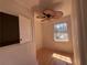 Bedroom with hardwood floors, a ceiling fan, and natural light from the window at 4625 Orkney Sw Ln, Atlanta, GA 30331