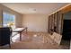 Living room shows open concept design with natural light from the windows at 4625 Orkney Sw Ln, Atlanta, GA 30331