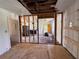 Interior view of a living room showing exposed beams, flooring, and natural light at 4625 Orkney Sw Ln, Atlanta, GA 30331