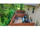 Aerial view of a fenced backyard with patio furniture, gravel, and a small garden at 2474 Whiteoak Se Run # 18, Smyrna, GA 30080
