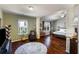Expansive bedroom with hardwood floors, natural light, a ceiling fan, and neutral-colored walls at 2474 Whiteoak Se Run # 18, Smyrna, GA 30080