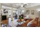 Inviting living room with coffered ceiling, hardwood floors, and an open layout at 2474 Whiteoak Se Run # 18, Smyrna, GA 30080