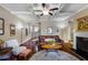 Cozy living room with fireplace, hardwood floors, area rug, and neutral wall paint with stylish art at 2474 Whiteoak Se Run # 18, Smyrna, GA 30080