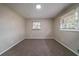 Cozy bedroom features neutral walls, carpet, and natural light at 3680 Brookcrest Cir, Decatur, GA 30032