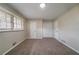 Bedroom features neutral walls, carpet, and natural light at 3680 Brookcrest Cir, Decatur, GA 30032