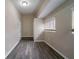 Hallway featuring hardwood floors, neutral walls, with access to various rooms in the home at 3680 Brookcrest Cir, Decatur, GA 30032
