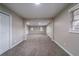 Living room with neutral walls, carpet, and windows at 3680 Brookcrest Cir, Decatur, GA 30032