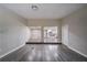 Open-concept living space with hardwood floors, seamlessly connecting to a modern kitchen at 3680 Brookcrest Cir, Decatur, GA 30032