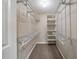 Walk-in closet with shelves and hanging rods at 3680 Brookcrest Cir, Decatur, GA 30032