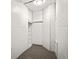 Unfinished basement storage with shelving at 3973 Elmscourt Dr, Stone Mountain, GA 30083