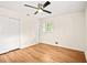 Bedroom featuring hardwood floors and closet at 3973 Elmscourt Dr, Stone Mountain, GA 30083