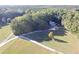 Sprawling property surrounded by lush trees and large open fields at 4424 Lower Fayetteville Rd, Sharpsburg, GA 30277