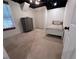 Simple carpeted bedroom with a bed and dresser, offering a cozy atmosphere at 4424 Lower Fayetteville Rd, Sharpsburg, GA 30277