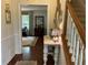 Inviting entryway with wood floors and a view into the living area at 4424 Lower Fayetteville Rd, Sharpsburg, GA 30277