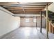Unfinished basement showcasing exposed ceiling, wood framing and a staircase at 4641 Waterford Ct, Atlanta, GA 30338