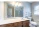 Bathroom with a standard vanity featuring generous countertop space and updated fixtures in a clean, simple design at 4641 Waterford Ct, Atlanta, GA 30338