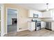 Updated kitchen with stainless steel appliances, including a microwave and oven, and granite countertops at 4641 Waterford Ct, Atlanta, GA 30338