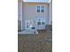 Backyard view with gray siding and patio at 534 Magnolia Cir, Palmetto, GA 30268