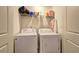 Functional laundry area featuring a washer and dryer, perfect for efficient home management at 534 Magnolia Cir, Palmetto, GA 30268
